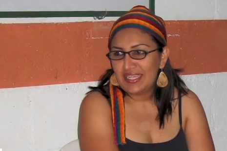 Zenayda Serrano, anti-mining leader, gives a saludo to CISPES!